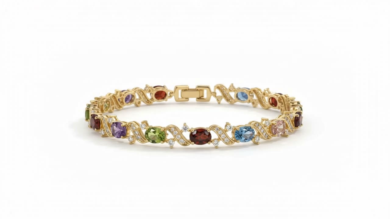 A gold bracelet set with coloured stones