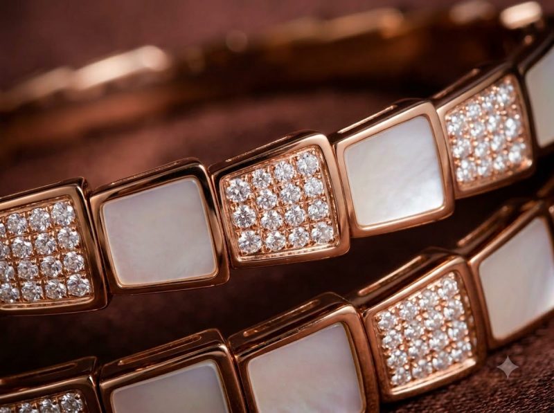 Close-up of a rose-gold wraparound bracelet set with pavé squares